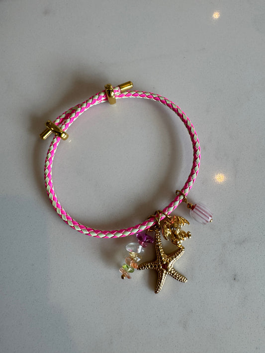 Pink paracord charm bracelet