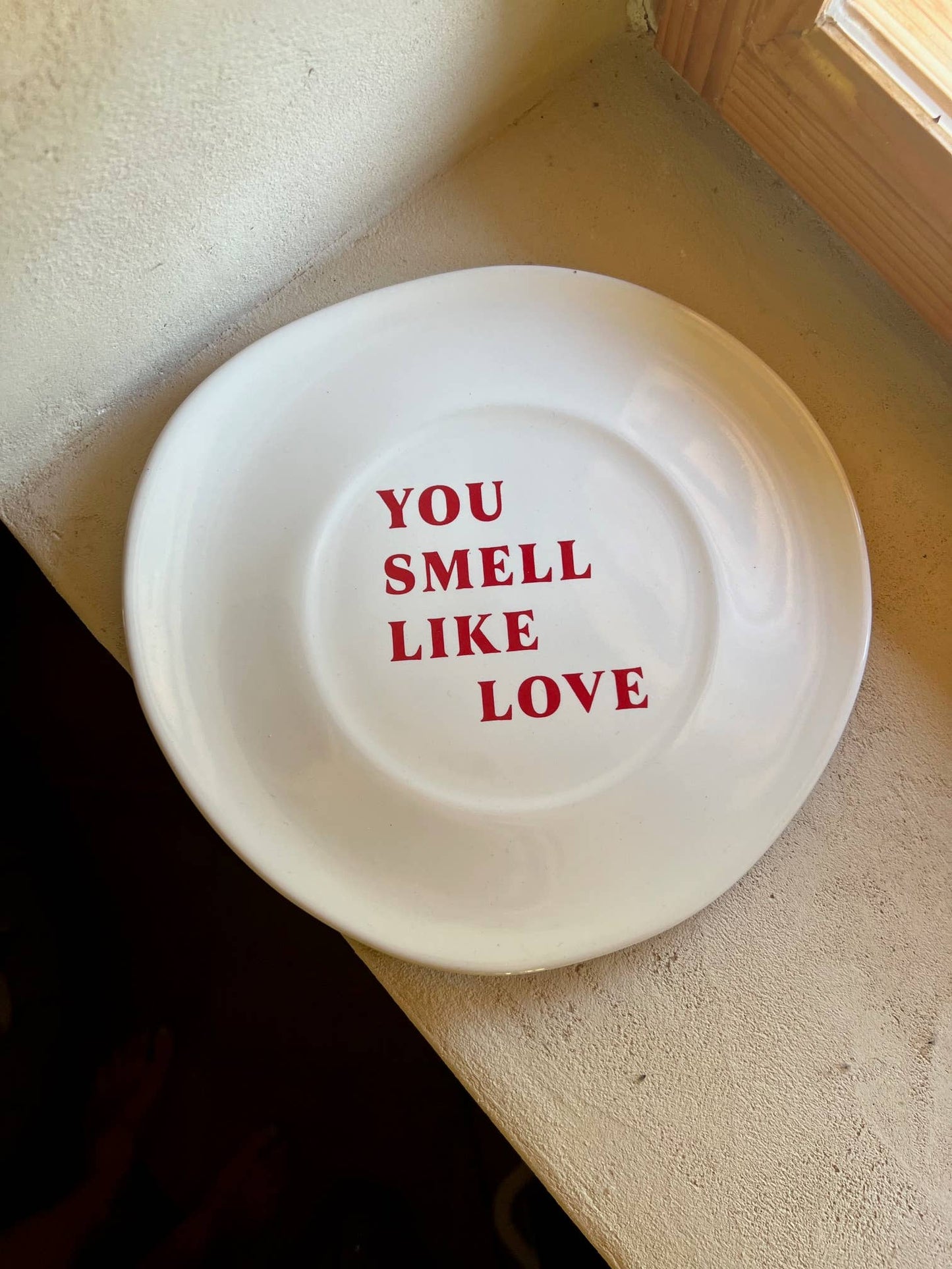 You smell like Love plate