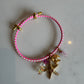 Pink paracord charm bracelet