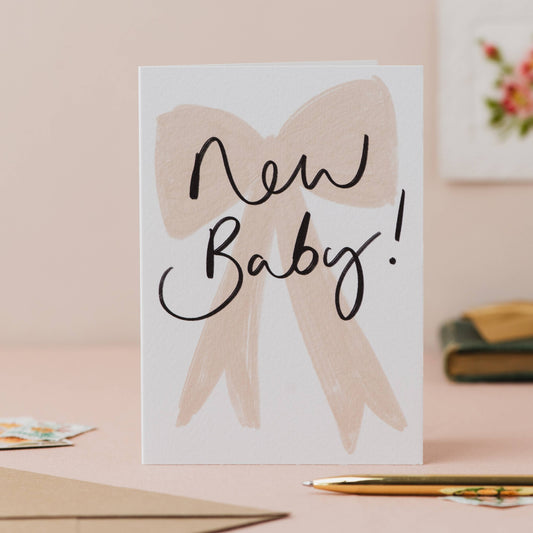 'New Baby!' Bow Handwriting Baby Card: Naked
