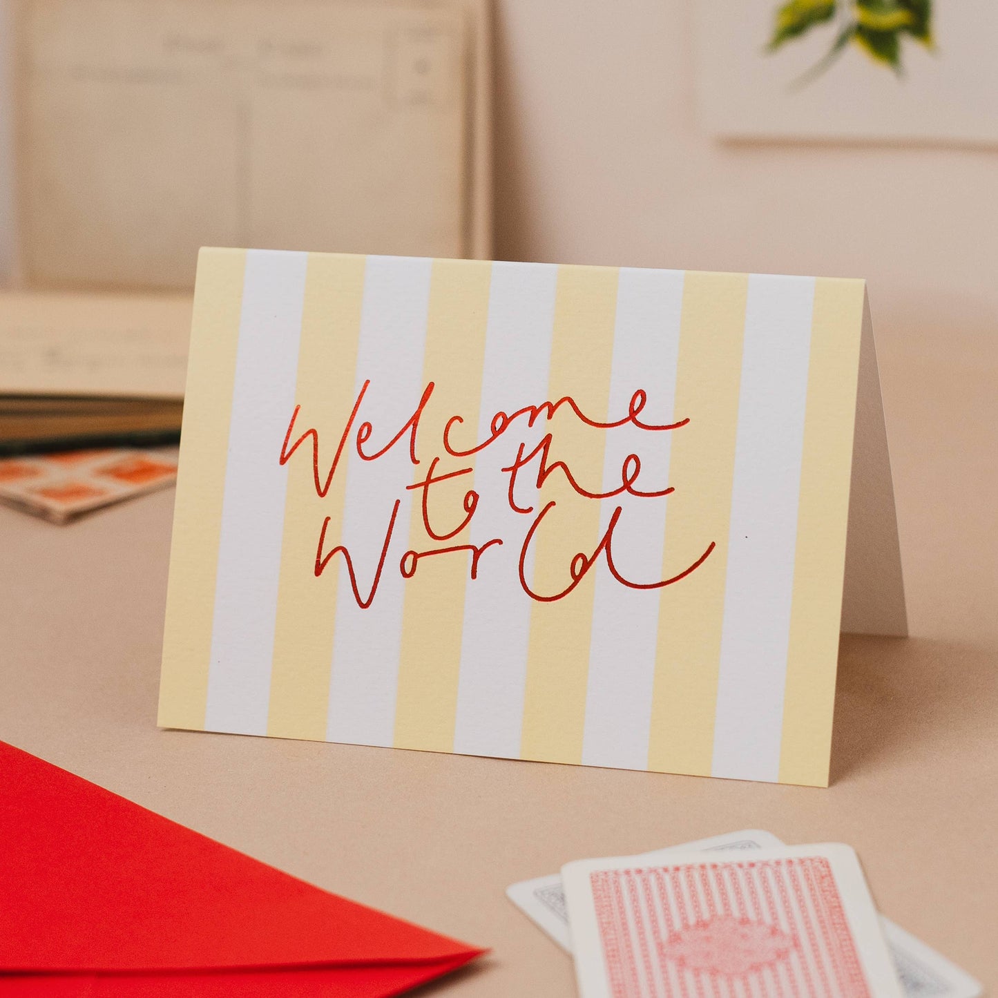 'Welcome to the World' Yellow Stripe Red Foil New Baby Card: Naked