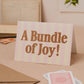 'A Bundle of Joy!' New Baby Card with Biodegradable Glitter: Naked
