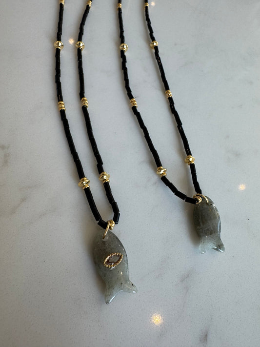 Black fish charm necklace