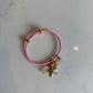 Pink paracord charm bracelet